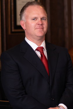 Dallas defense attorney Richard McConathy poses for a photo in his office